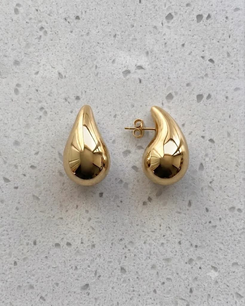 Aretes gotas doradas, medianas, en rodio, vista principal